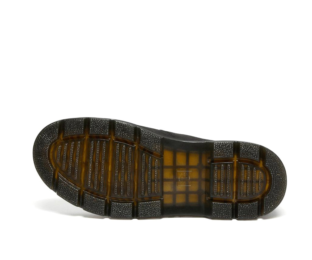 A black, softened leather chelsea boot from Dr. Martens with yellow accent stitching.