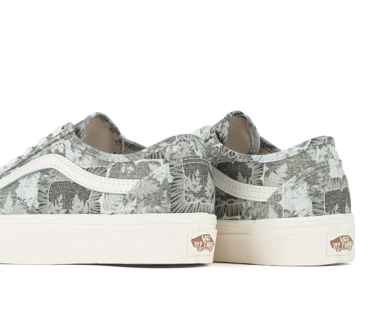 A green floral low-top Vans sneaker.