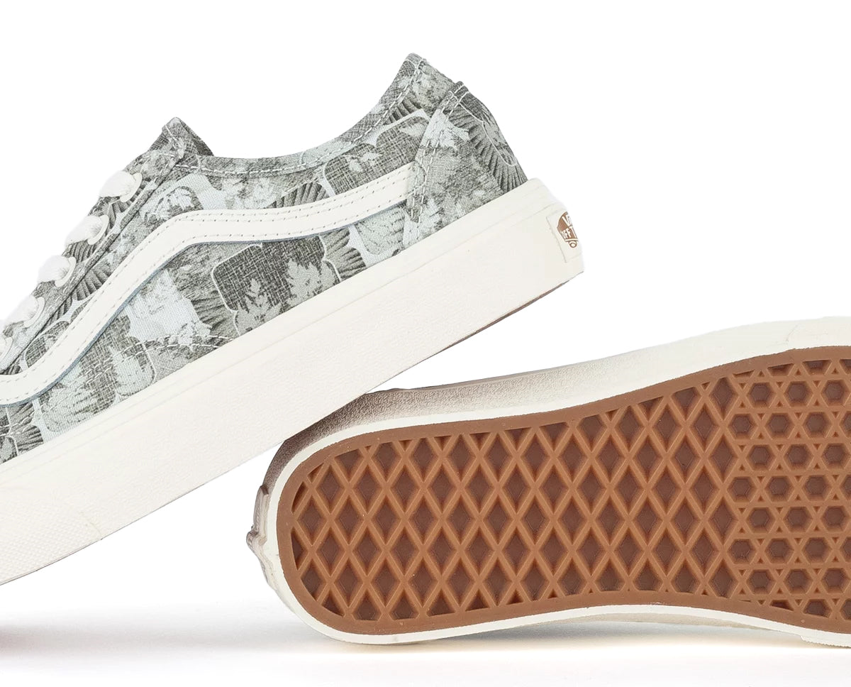 A green floral low-top Vans sneaker.