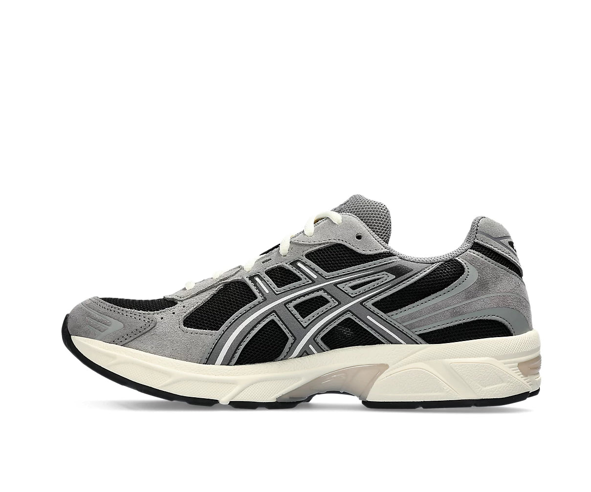 A black and gray running shoe from ASICS.