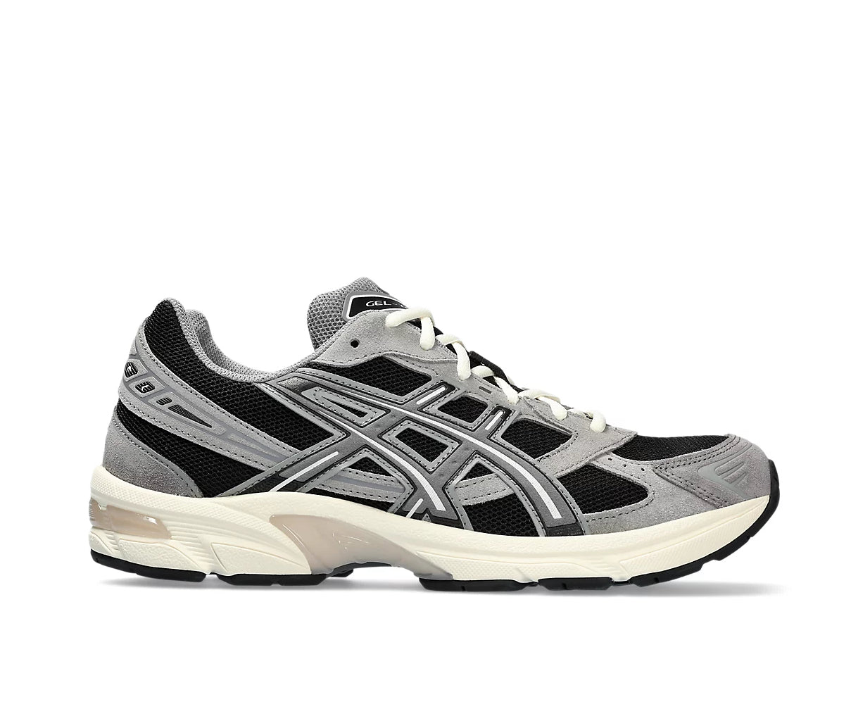 A black and gray running shoe from ASICS.