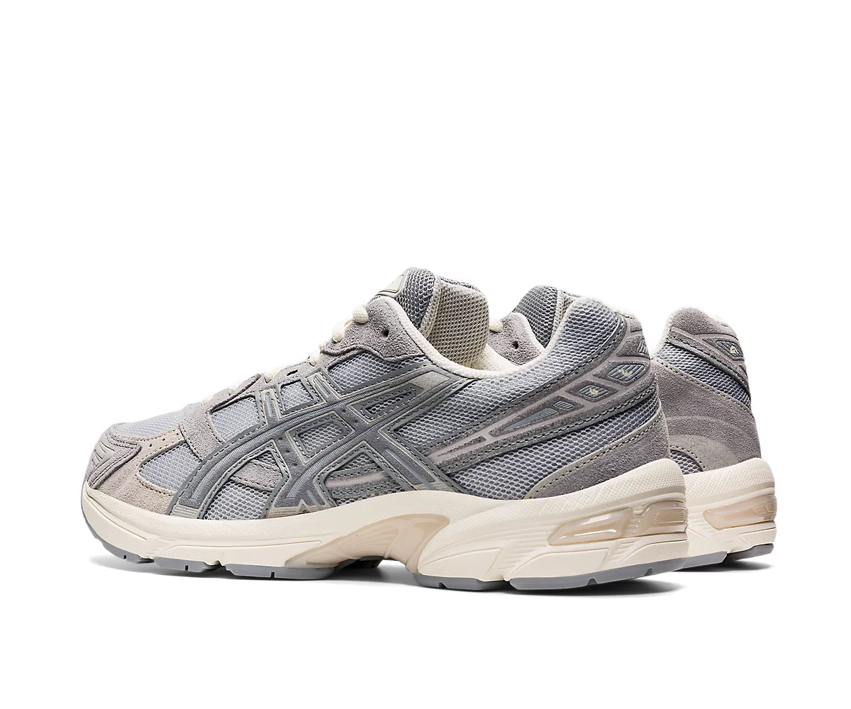 A gray running shoe from ASICS.