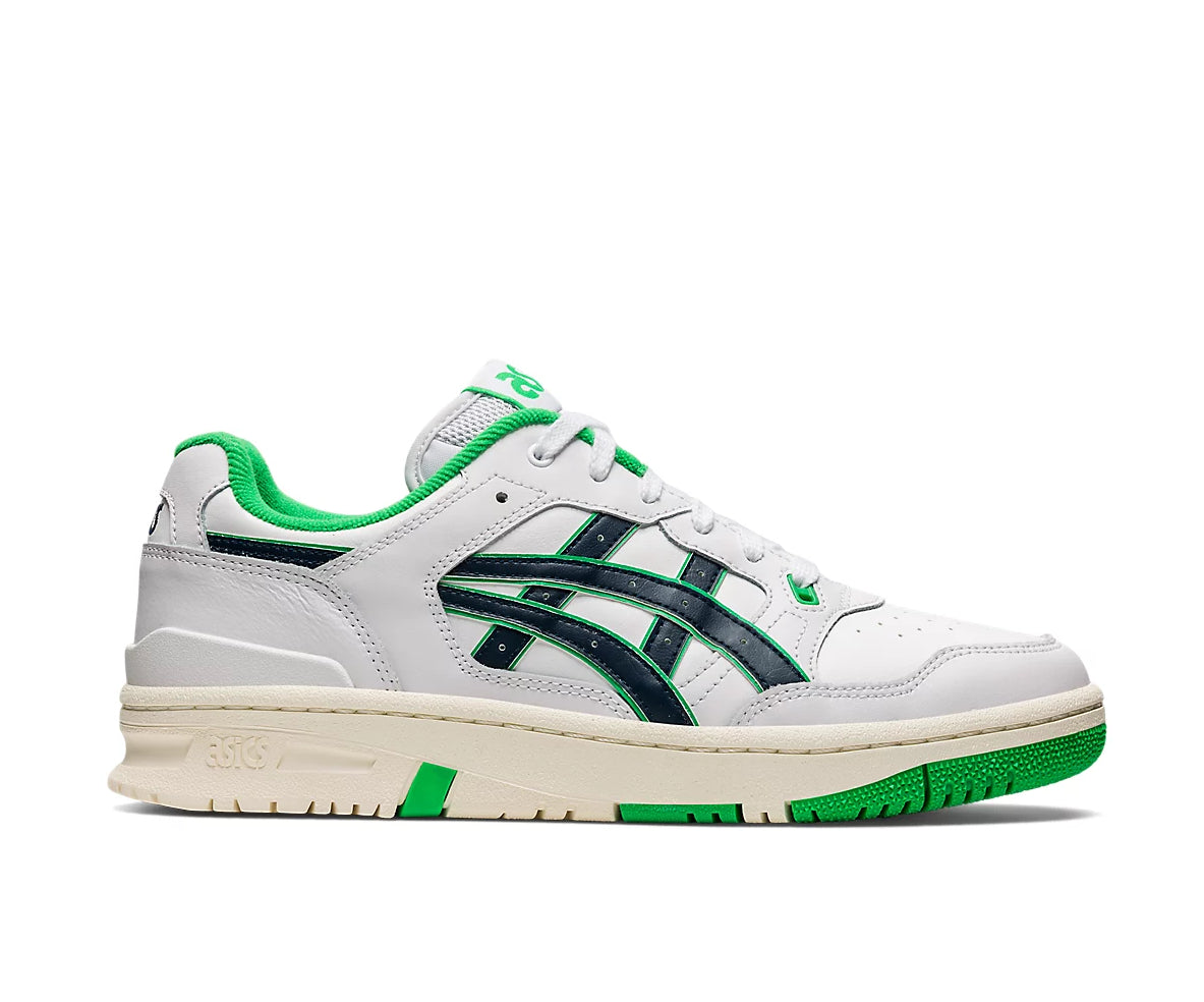 A white leather asics sneaker with lime green and navy blue accents.