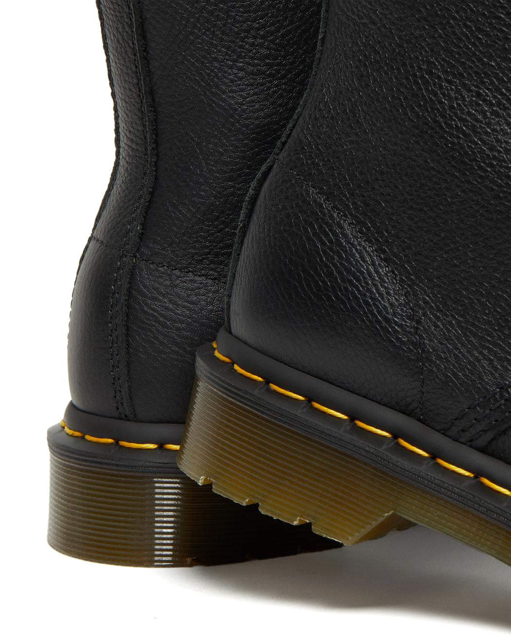 A black soft leather Dr. Martens ankle boot.