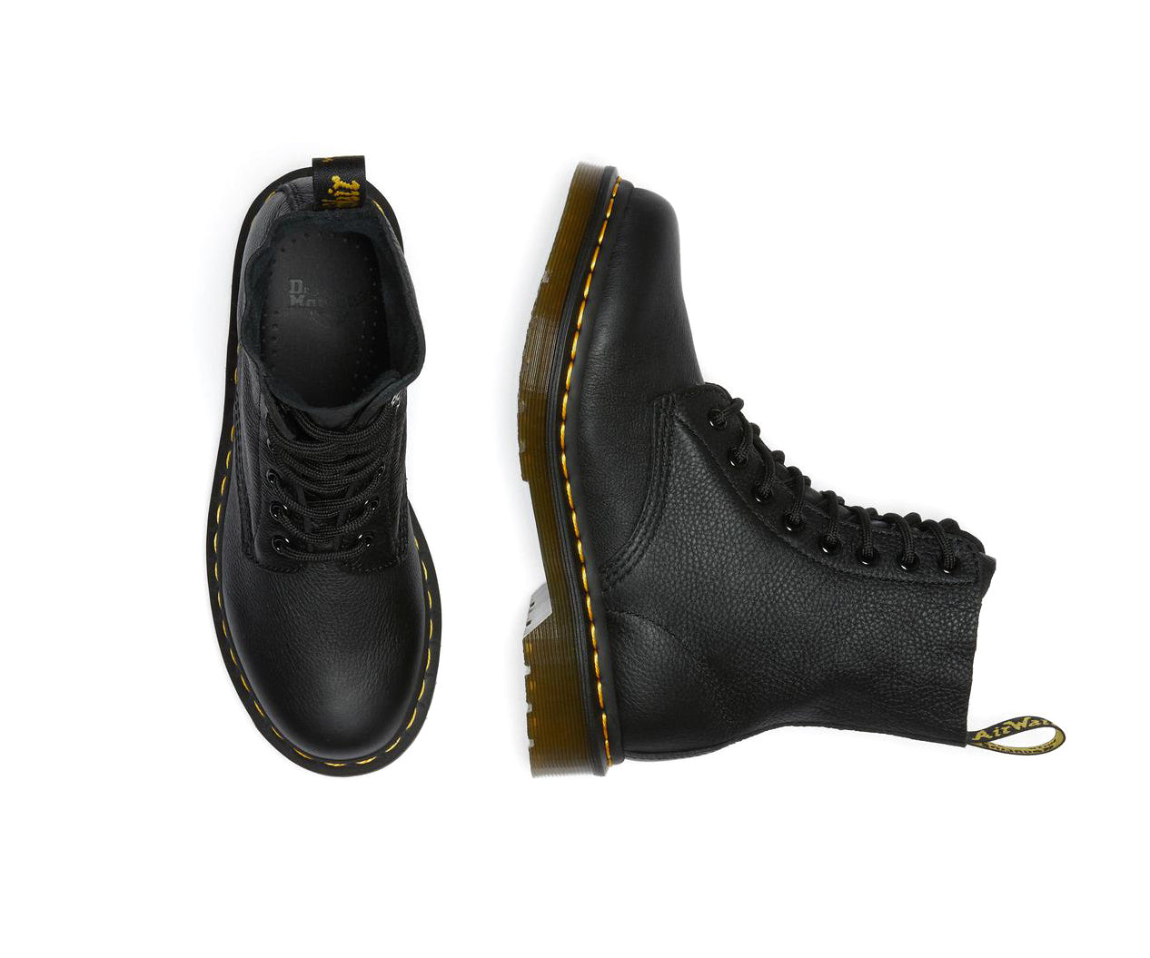 A black soft leather Dr. Martens ankle boot.