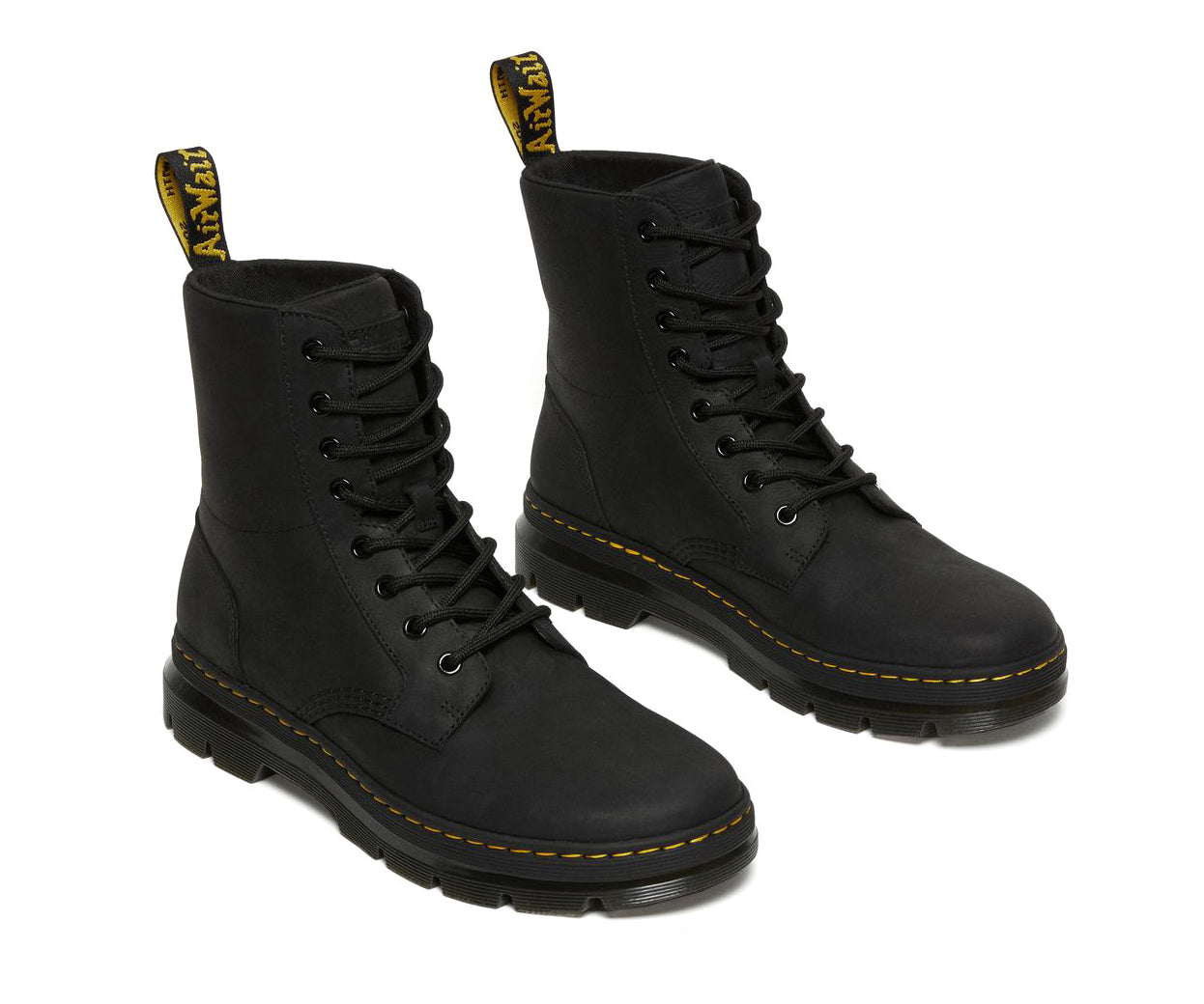 A black, softened leather boot from Dr. Martens.