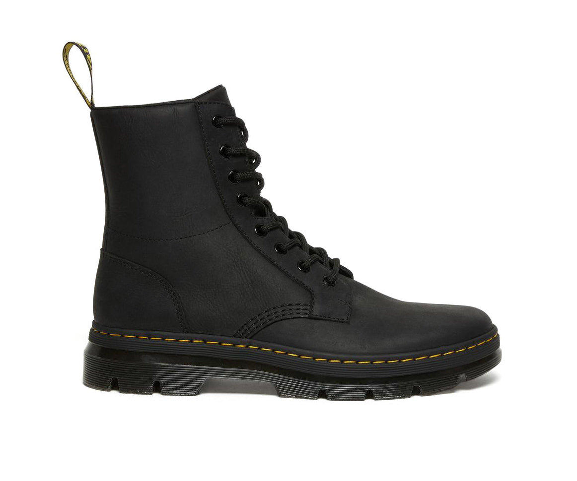 A black, softened leather boot from Dr. Martens.