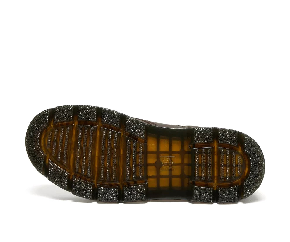 A dark brown leather shoe from Dr. Martens.