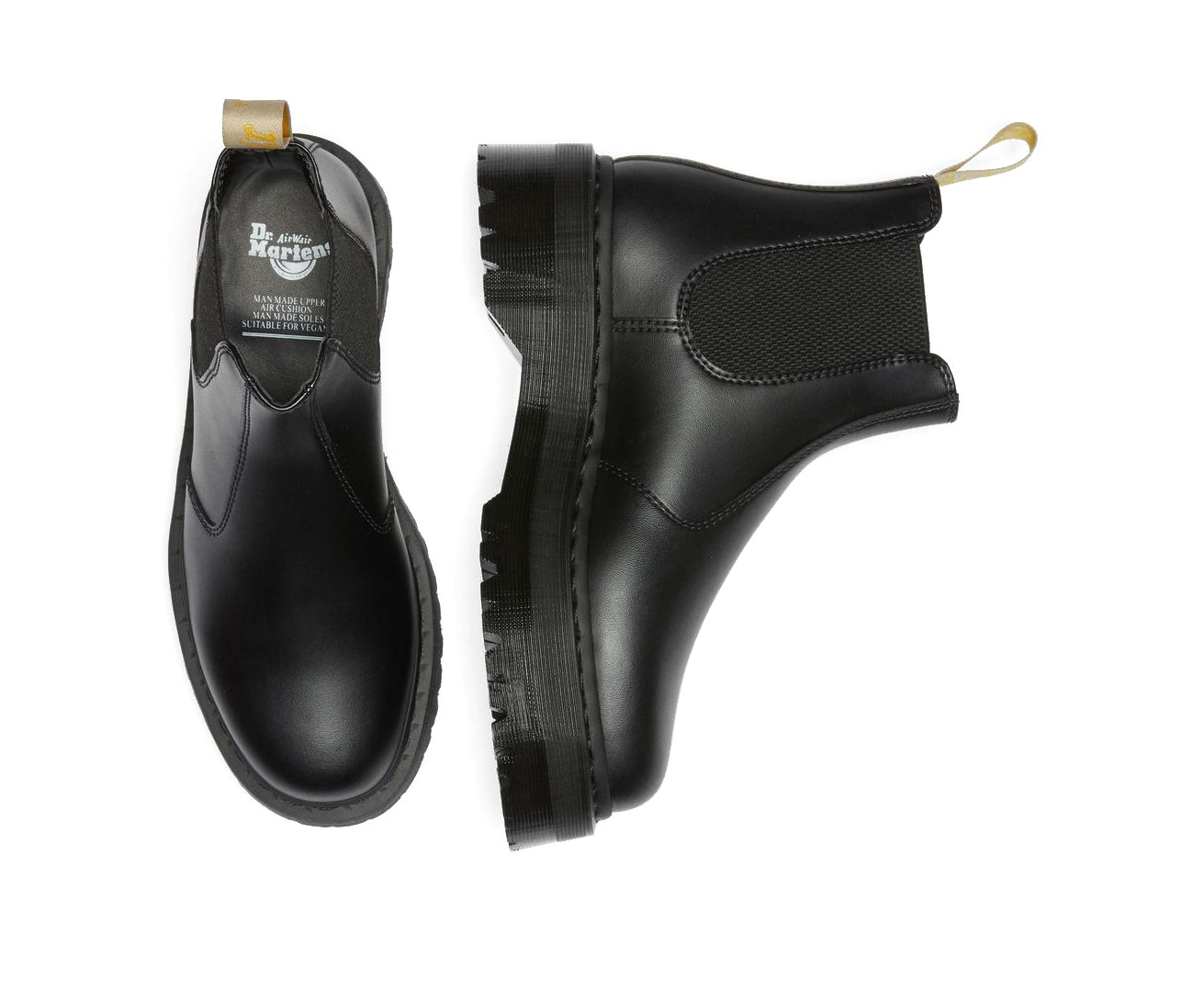 A black vegan leather Dr. Martens ankle boot.