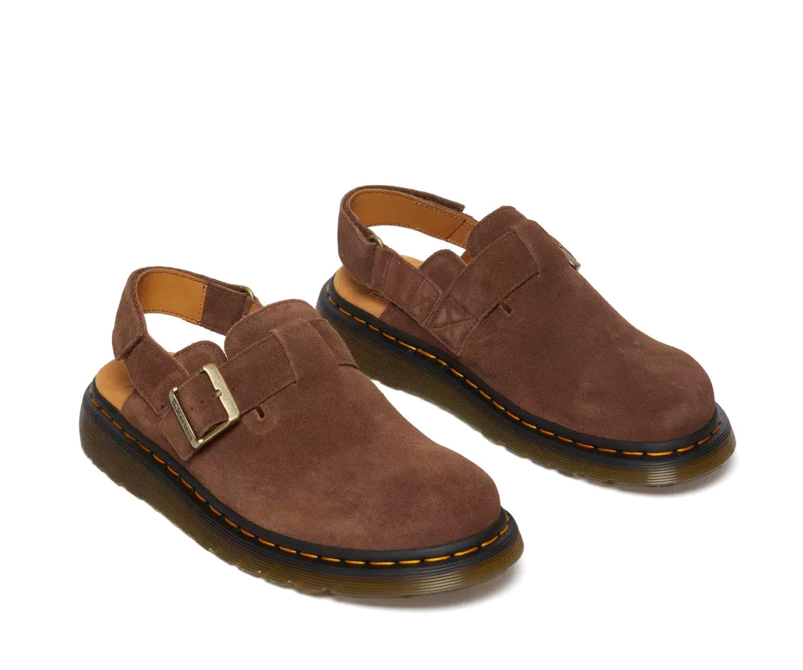 A brown suede mule sandal from Dr. Martens.