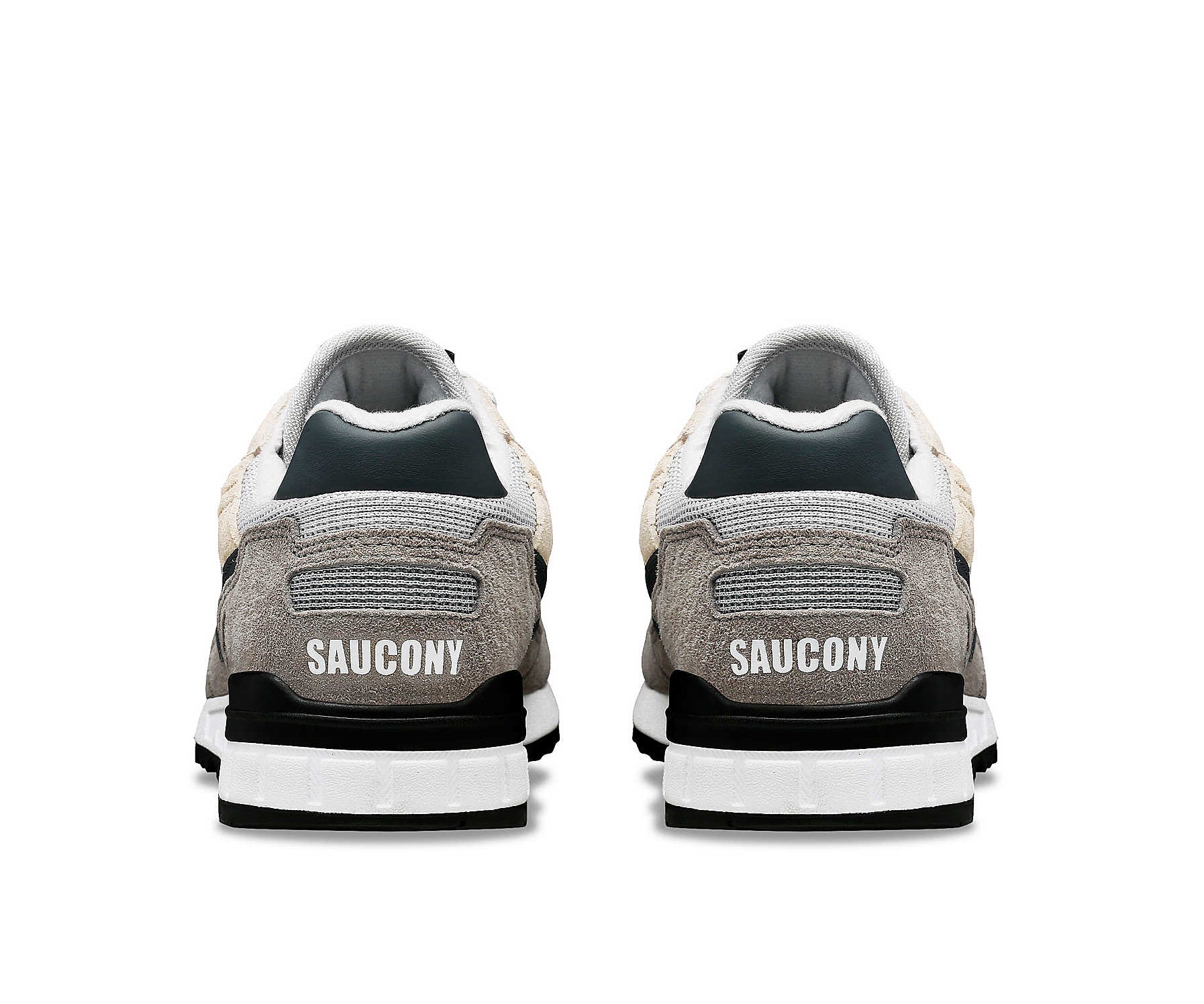 A gray and white running shoe from Saucony.