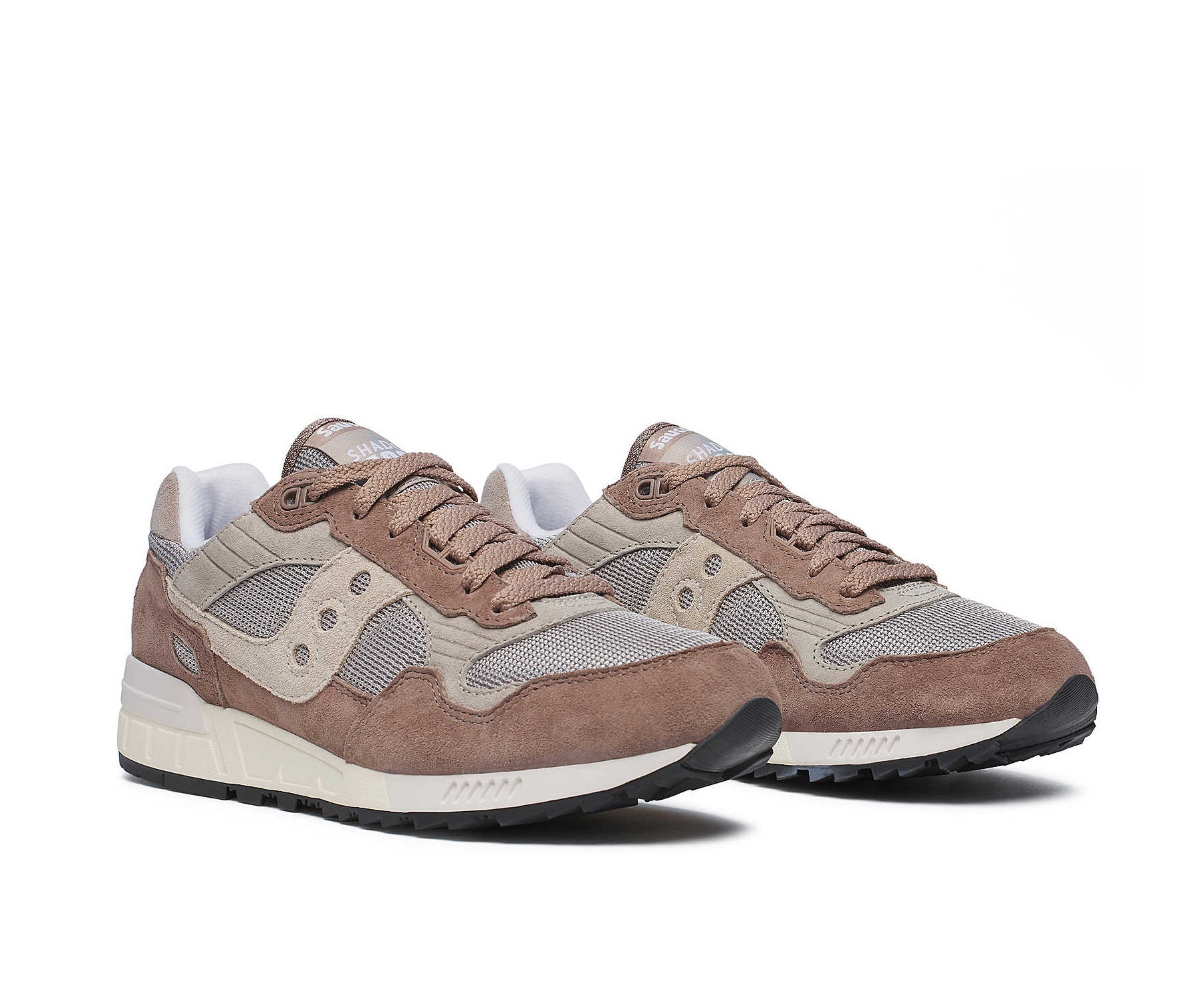 A brown and beige sneaker from Saucony.