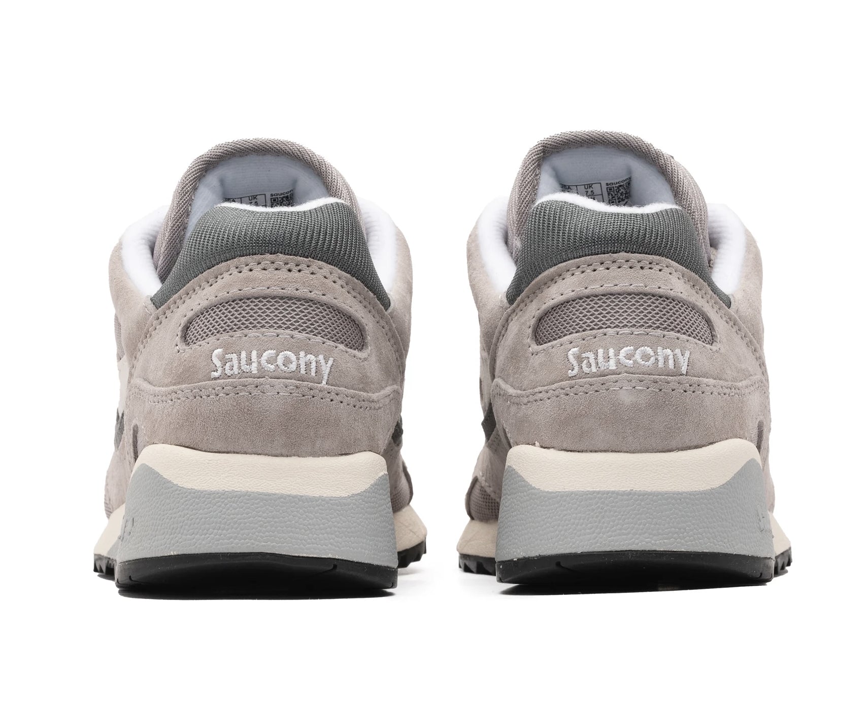 A gray sneaker with darker gray and white accents from Saucony.