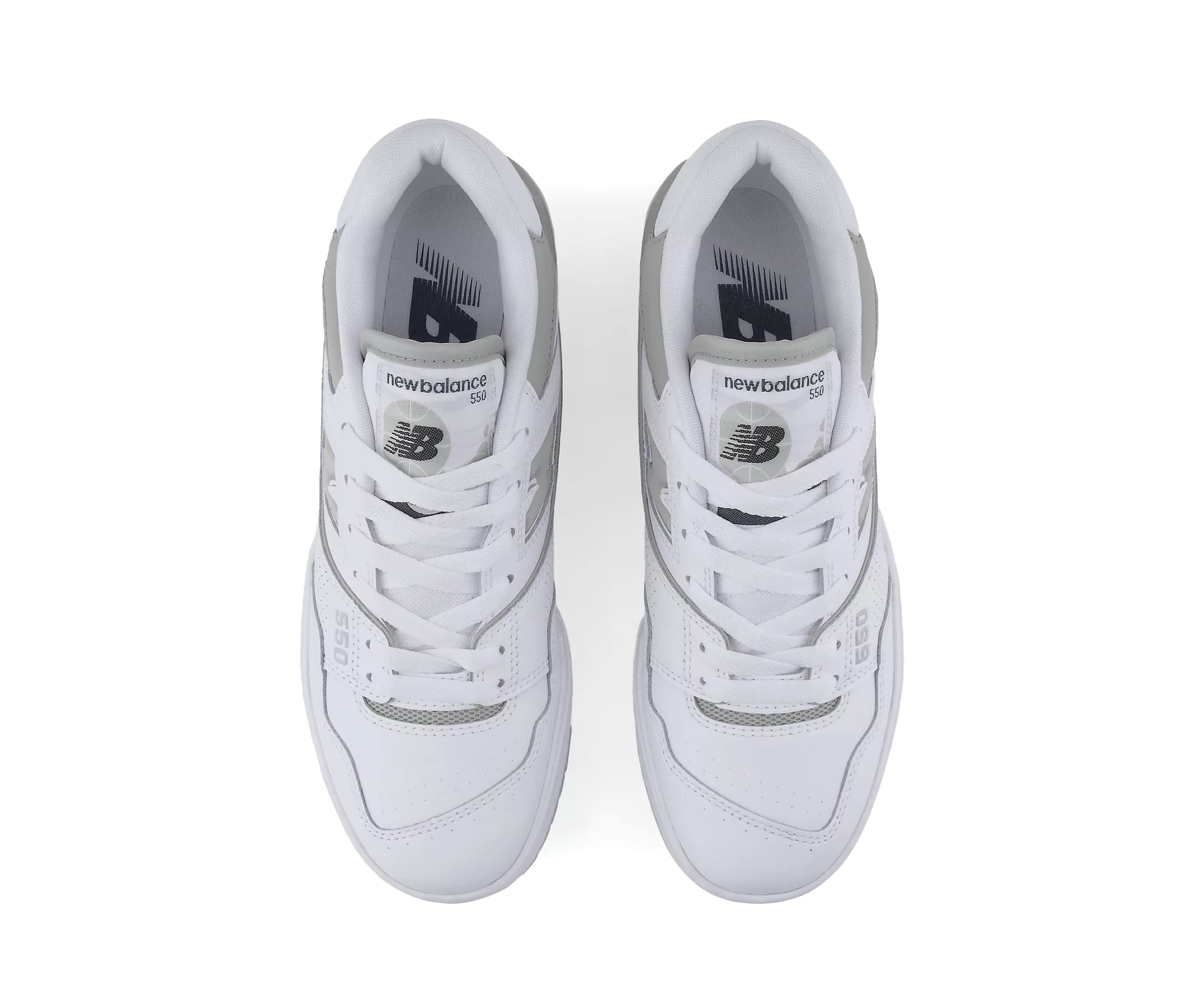 A white leather court shoe from New Balance with gray accents.