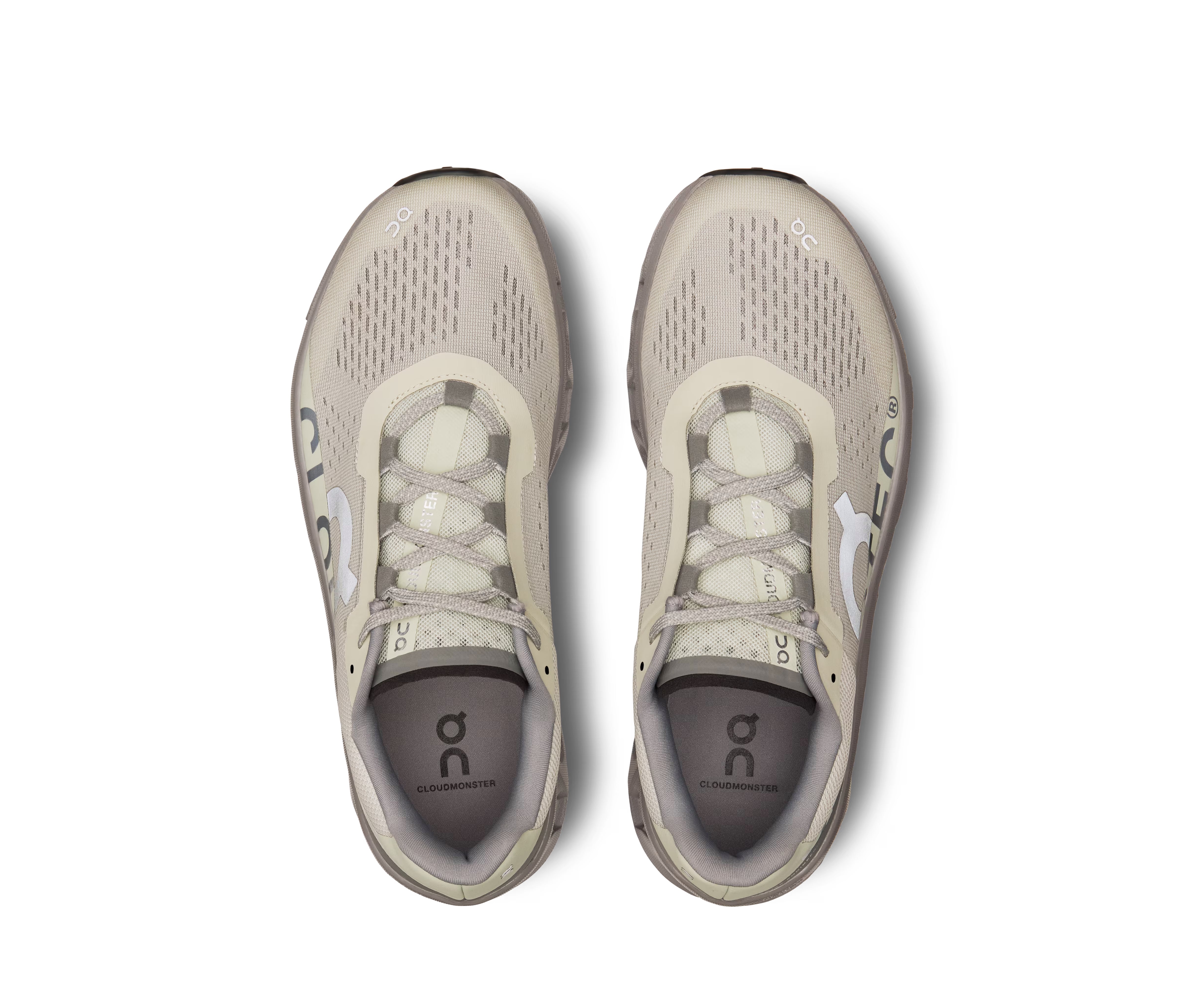 A gray and beige sneaker from On Running.