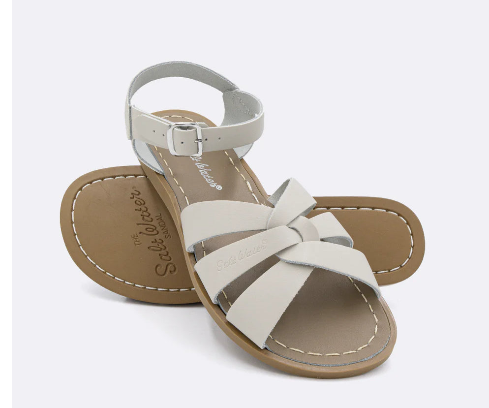 An ivory white leather 3-strap sandal from Salt Water.