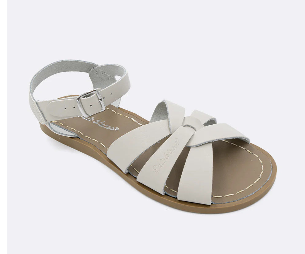 An ivory white leather 3-strap sandal from Salt Water.