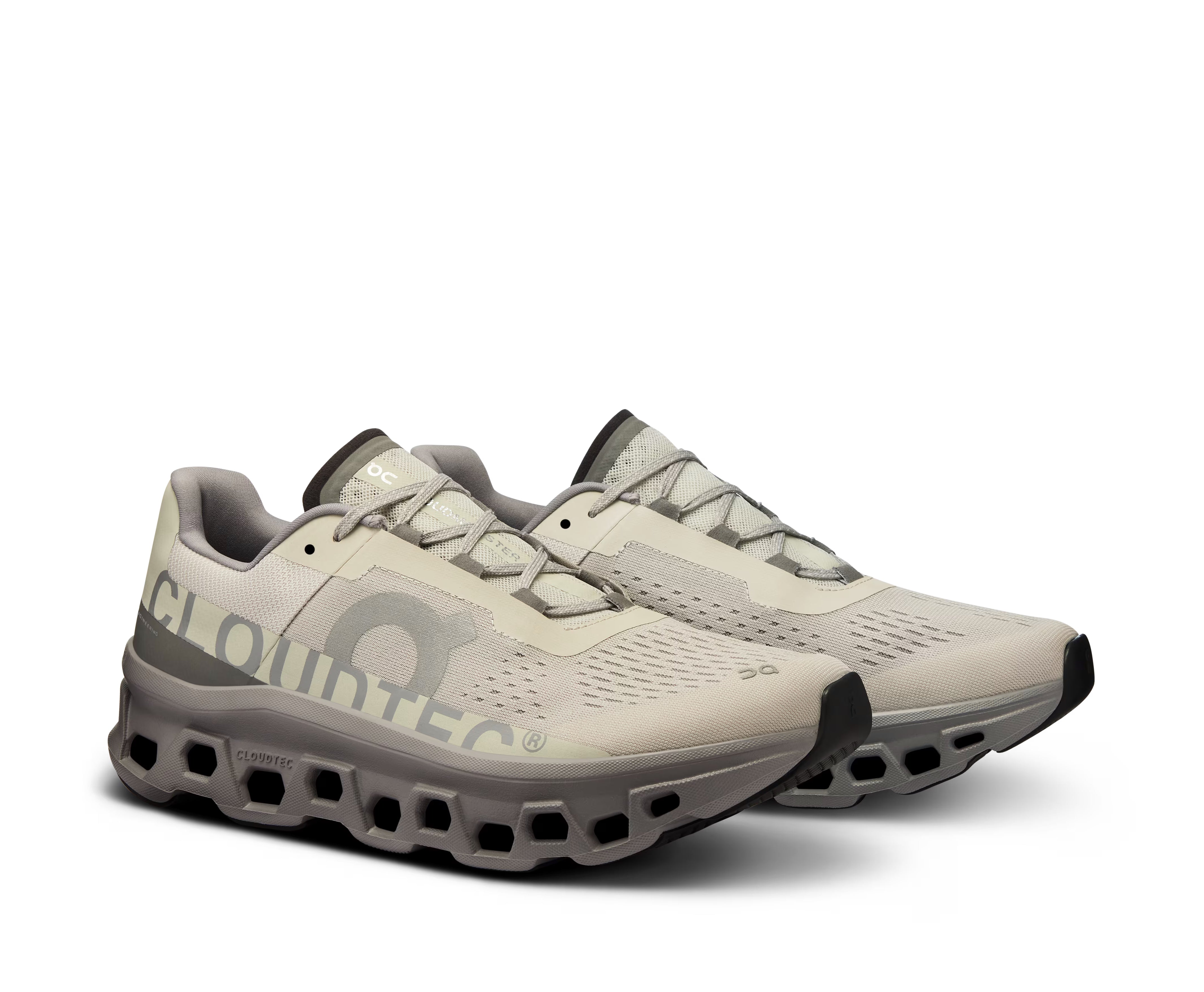 A gray and beige sneaker from On Running.